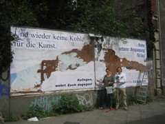 Plakatwandbesetzung 2008 mit Marc Hompesch + Gine Selle.